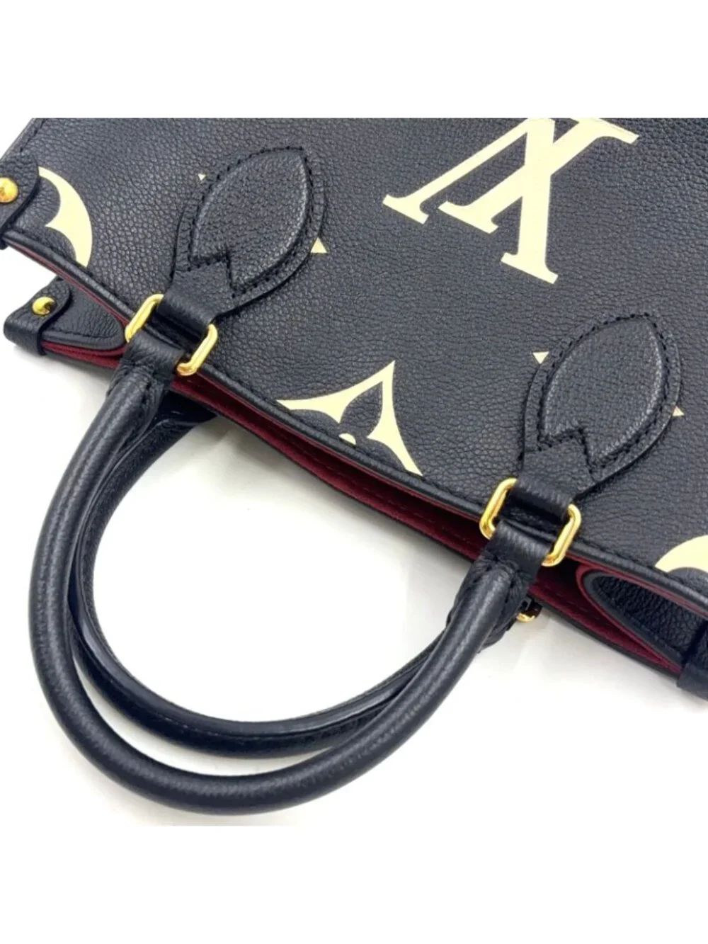 Louis Vuitton On The Go PM Bicolor Monogram Empreinte Leather Black Handbag Gold